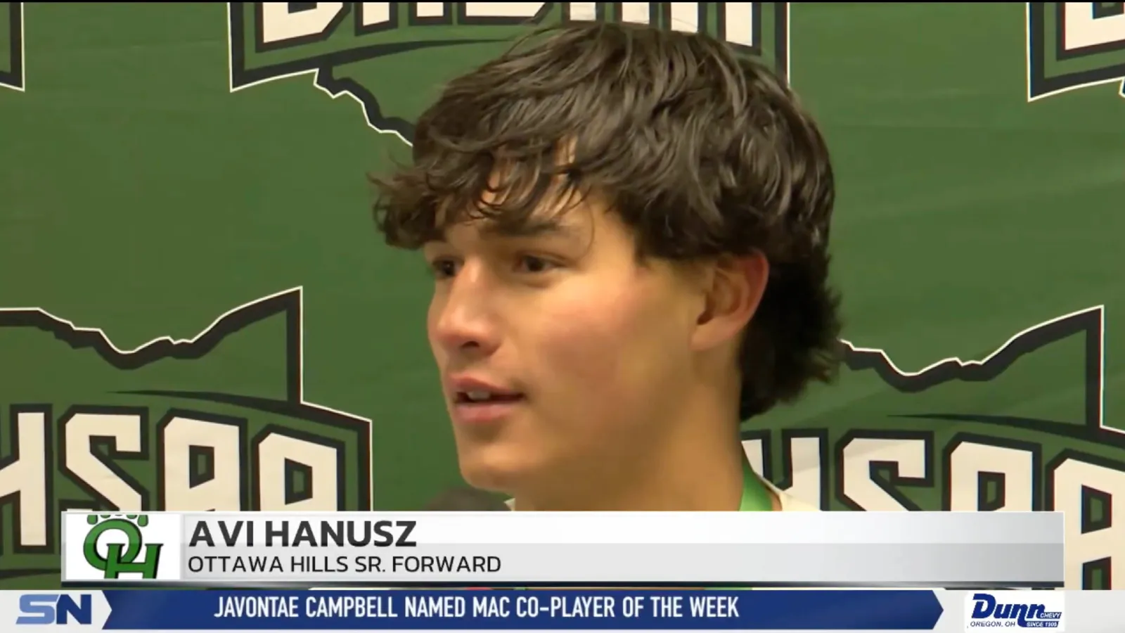 Avi Hanusz giving a post-game interview